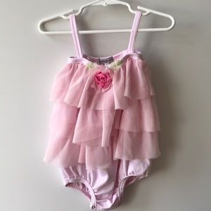 Ruffled silk with rosette leotard